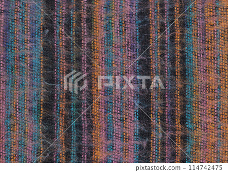 Nepalese textile background. Woven ethnic fabric texture Nepalese textile background. Woven ethnic fabric texture 114742475