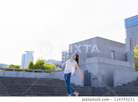 Woman dancing on stage Woman dancing on stage 114743211