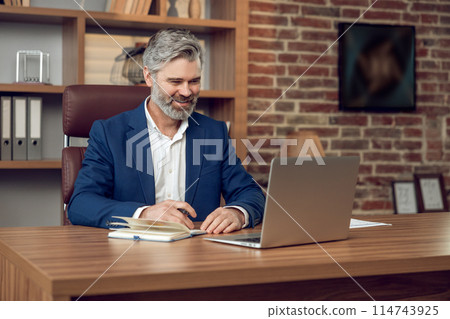 Professional man counselor leveraging internet platforms for therapy sessions 114743925