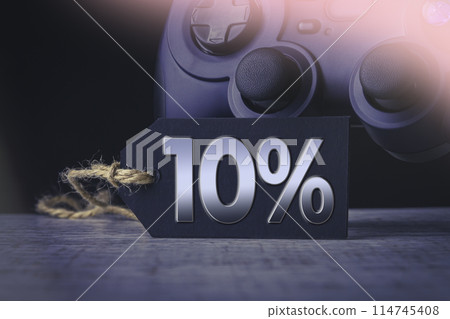 10 percent discount on video game sale. Black friday. Sale of goods for game consoles. 114745408