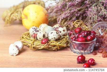 spring composition, nest with eggs near the bunch of heather, Easter. 114745784