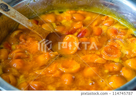Apricot jam cooked in a bowl Apricot jam cooked in a bowl 114745787