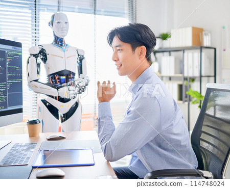 IT engineer 1 programming while receiving advice from an android 114748024