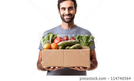Strong man with a box of fruits and vegetables on a white background 114748564