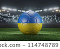 Soccer ball in flag colors on a bright blurred stadium background. Ukraine. 3D image 114748789