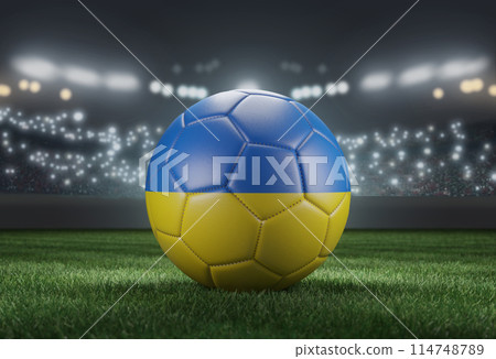 Soccer ball in flag colors on a bright blurred stadium background. Ukraine. 3D image Soccer ball in flag colors on a bright blurred stadium background. Ukraine. 3D image 114748789