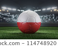 Soccer ball in flag colors on a bright blurred stadium background. Poland. 3D image 114748920