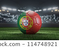 Soccer ball in flag colors on a bright blurred stadium background. Portugal. 3D image 114748921