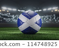 Soccer ball in flag colors on a bright blurred stadium background. Scotland. 3D image 114748925