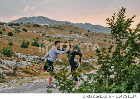 A Romantic Couple Stretching Down After a Run A Romantic Couple Stretching Down After a Run 114751134
