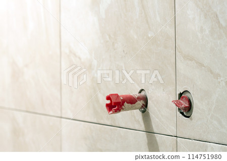House construction and renovating, pipes and plumbing tools. Bathroom details with installation of pipes. Installing pipes for water supply, heating, sanitation. Workplace plumbing in construction 114751980