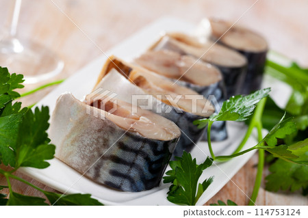 Tasty slices of lightly salted mackerel with greens Tasty slices of lightly salted mackerel with greens 114753124