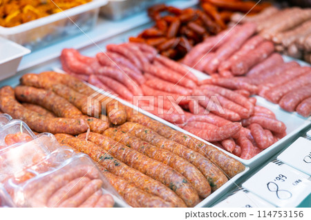 Chorizo, morcilla, butifarra and chistorra sausages for sale in showcase 114753156