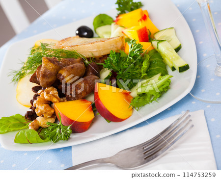 Salad with roasted chicken hearts Salad with roasted chicken hearts 114753259