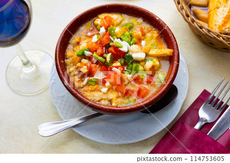 Typical summer dish Cojondongo from Extremadura in earthenware bowl Typical summer dish Cojondongo from Extremadura in earthenware bowl 114753605