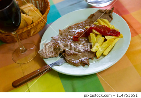Lamb fillet with french fries 114753651