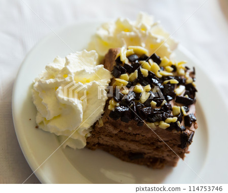 Chocolate cake with whipped cream Chocolate cake with whipped cream 114753746