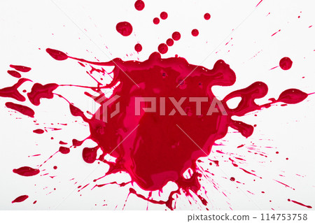 Splash of red paint on white surface 114753758