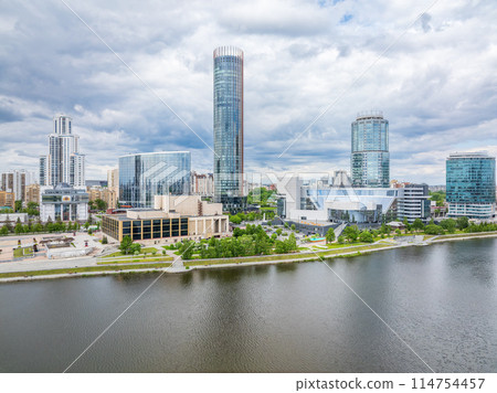 Yekaterinburg city with Buildings of Regional Government and Parliament, Dramatic Theatre, Iset Tower, Yeltsin Center, panoramic view at summer sunset. 114754457