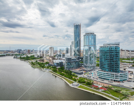 Yekaterinburg city with Buildings of Regional Government and Parliament, Dramatic Theatre, Iset Tower, Yeltsin Center, panoramic view at summer sunset. 114754465
