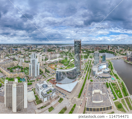 Yekaterinburg city with Buildings of Regional Government and Parliament, Dramatic Theatre, Iset Tower, Yeltsin Center, panoramic view at summer sunset. Yekaterinburg city with Buildings of Regional Government and Parliament, Dramatic Theatre, Iset Tower, Yeltsin Center, panoramic view at summer sunset. 114754471