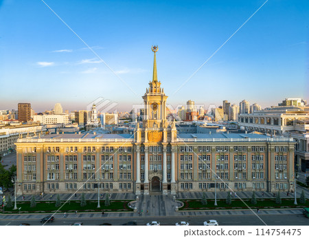 Yekaterinburg City Administration or City Hall and Central square at summer evening. Evening city in the summer sunset, Aerial View. Yekaterinburg City Administration or City Hall and Central square at summer evening. Evening city in the summer sunset, Aerial View. 114754475