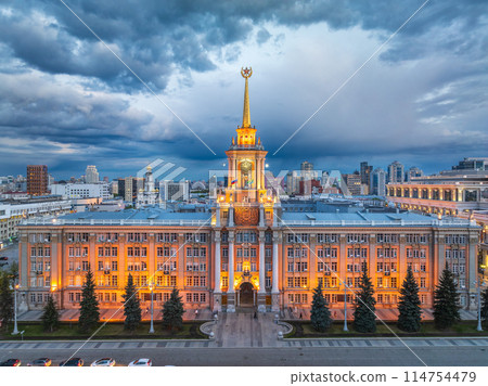 Yekaterinburg City Administration or City Hall and Central square at summer evening. Evening city in the summer sunset, Aerial View. Yekaterinburg City Administration or City Hall and Central square at summer evening. Evening city in the summer sunset, Aerial View. 114754479
