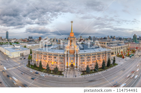 Yekaterinburg City Administration or City Hall and Central square at summer evening. Evening city in the summer sunset, Aerial View. Yekaterinburg City Administration or City Hall and Central square at summer evening. Evening city in the summer sunset, Aerial View. 114754491