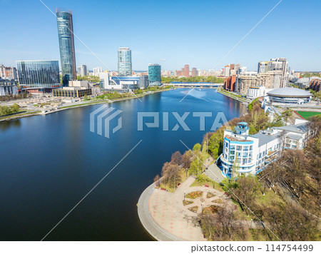 Yekaterinburg city with Buildings of Regional Government and Parliament, Dramatic Theatre, Iset Tower, Yeltsin Center, panoramic view at summer sunset. Yekaterinburg city with Buildings of Regional Government and Parliament, Dramatic Theatre, Iset Tower, Yeltsin Center, panoramic view at summer sunset. 114754499