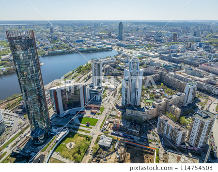 Yekaterinburg aerial panoramic view in spring at sunset. Yekaterinburg city and pond in spring or autumn. 114754503