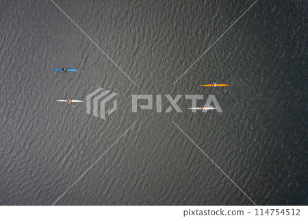 Kayaking top view. Group of kayaks rowing. Aerial view from drone. 114754512