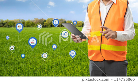 Agricultural engineer or farmer work with tablet in farm Agricultural engineer or farmer work with tablet in farm 114756860