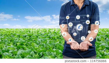 Agricultural engineer or farmer with graphic display in farm 114756866