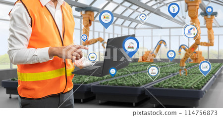 Agriculture technology concept with human control 3d rendering robotic arm in greenhouse 114756873