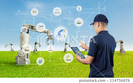 Agricultural engineer work with robotic arms in farm Agricultural engineer work with robotic arms in farm 114756876