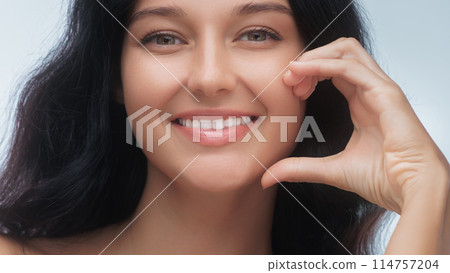 Bright Smile Beauty Woman Showcasing Dental Health Bright Smile Beauty Woman Showcasing Dental Health 114757204