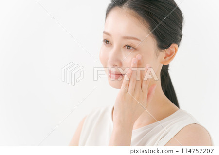 A young woman doing skin care A young woman doing skin care 114757207