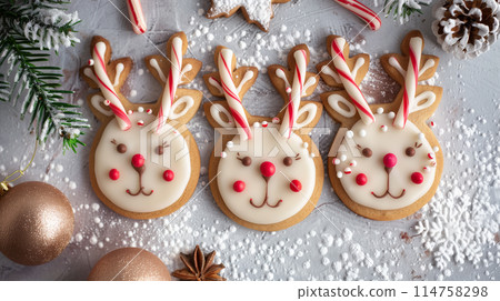 Reindeer cookies decorated with candy canes and icing. Reindeer cookies decorated with candy canes and icing. 114758298