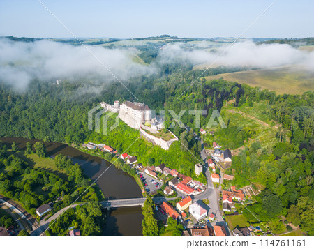 Cesky Sternberk castle and town at Sazava River on sunny summer morning. Aerial view from drone. Cesky Sternberk castle and town at Sazava River on sunny summer morning. Aerial view from drone. 114761161