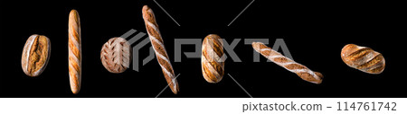 Set of fresh baked bread and French rye baguette isolated on black background Set of fresh baked bread and French rye baguette isolated on black background 114761742
