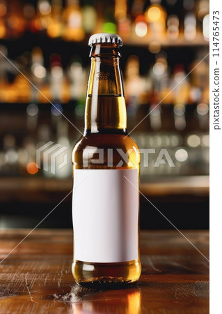 Chilled Beer Bottle with Blank Label on Wooden Bar Counter 114765473