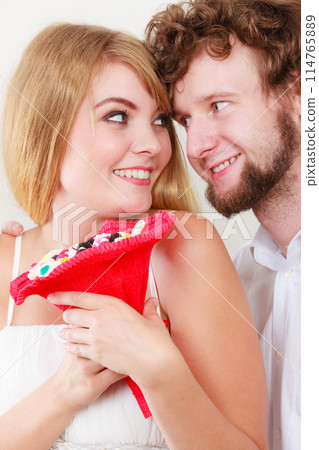 Loving couple with candy bunch flowers. Love. Loving couple with candy bunch flowers. Love. 114765889