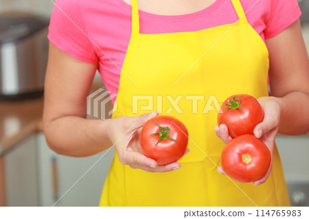Woman preparing fresh vegetables food salad 114765983