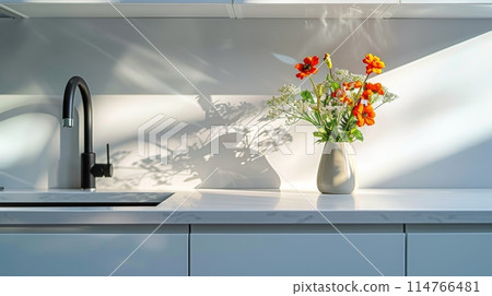 Vase With Flowers on White Table 114766481