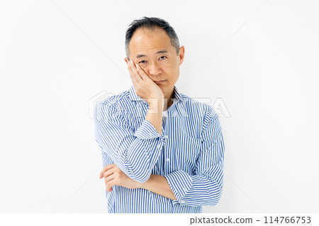 Middle-aged man, casual, worried Middle-aged man, casual, worried 114766753