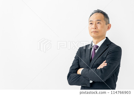 Middle male business arms crossed 114766903