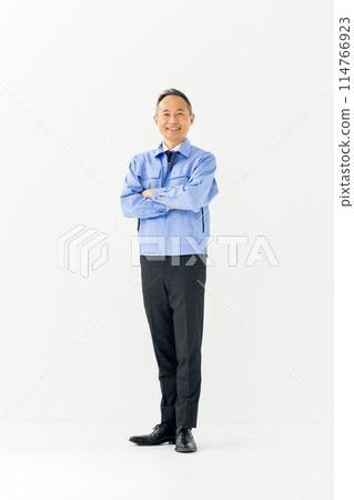 Man in work clothes, portrait, vertical Man in work clothes, portrait, vertical 114766923