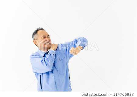 Middle-aged man, work clothes, stiff shoulders Middle-aged man, work clothes, stiff shoulders 114766987
