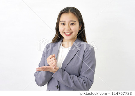 Inspired young business woman white background 114767728
