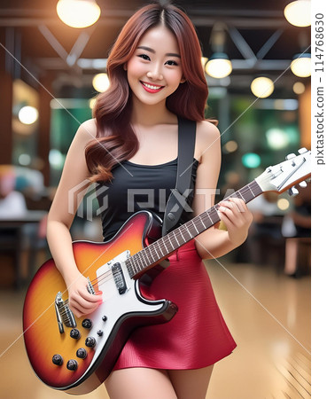 girl playing guitar 114768630